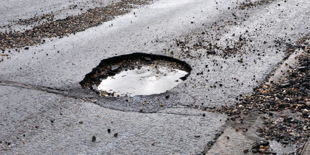 Can You Sue the Government if a Pothole Causes You to Crash Your Motorcycle?