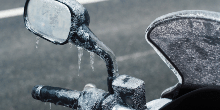 Image of a motorcycle covered in frost and icicles